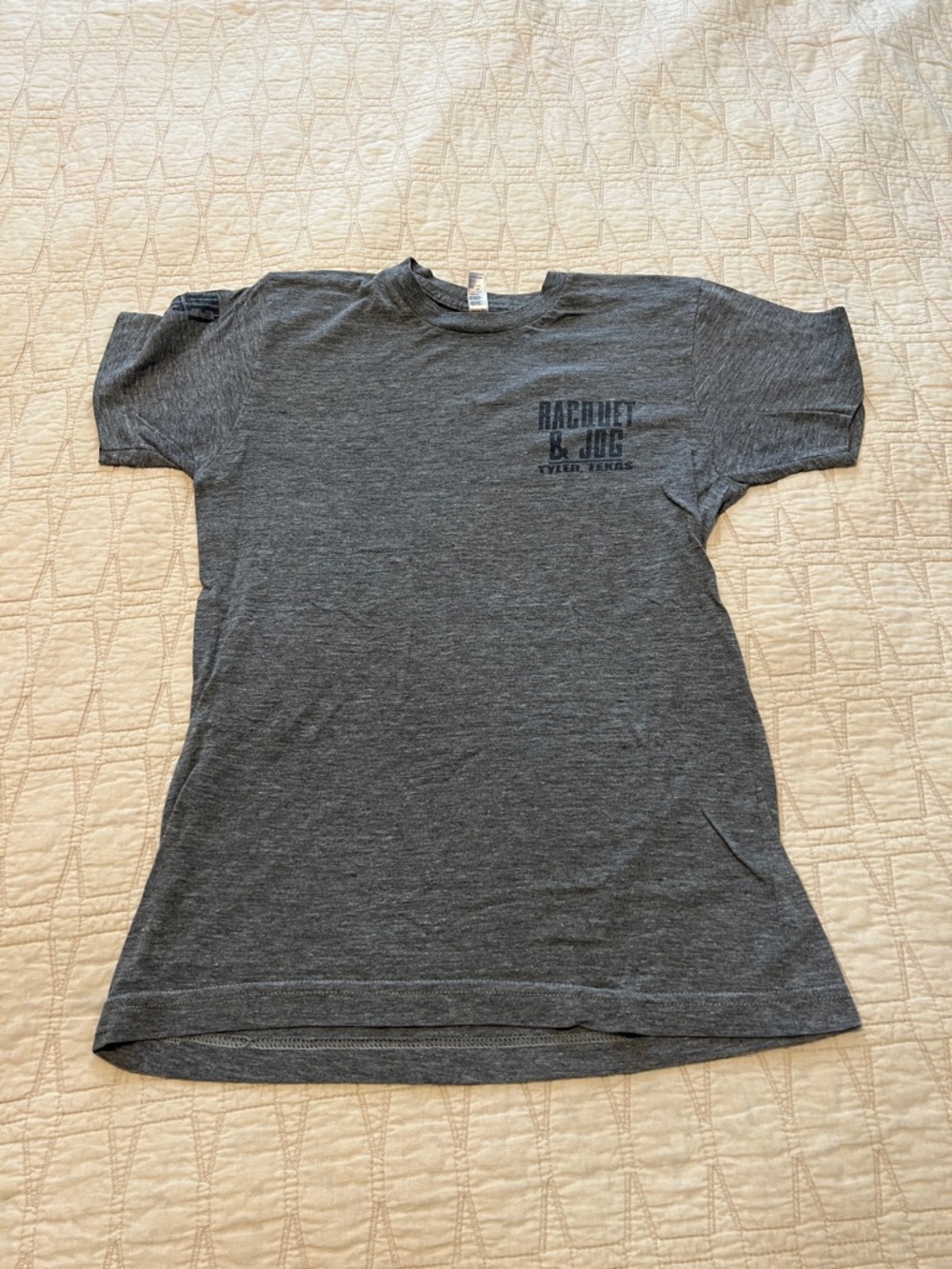 Small grey racquet & jog tshirt
